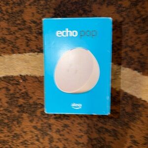 Amazon Echo Dot in Blue Box